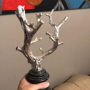 A foot high sturdy jewelry tree. Good for earrings necklaces and rings.